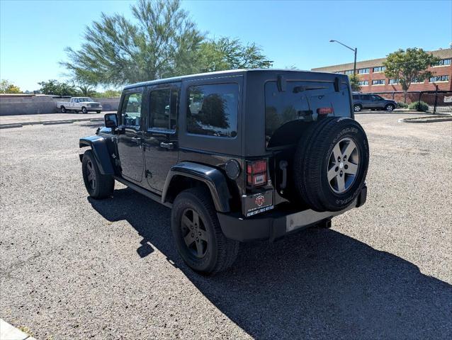 used 2013 Jeep Wrangler Unlimited car, priced at $17,488