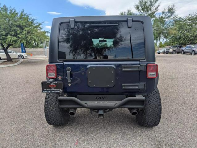 used 2013 Jeep Wrangler Unlimited car, priced at $17,288