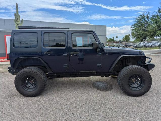 used 2013 Jeep Wrangler Unlimited car, priced at $17,288