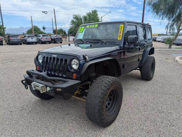 used 2013 Jeep Wrangler Unlimited car, priced at $17,288