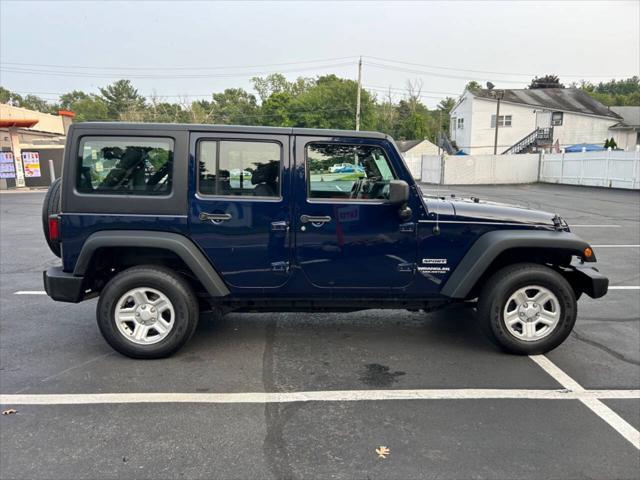 used 2013 Jeep Wrangler Unlimited car, priced at $16,500