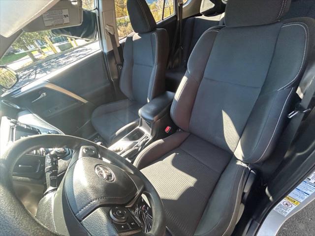 used 2015 Toyota RAV4 car, priced at $14,500