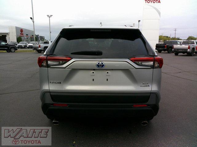 used 2022 Toyota RAV4 Hybrid car, priced at $31,800