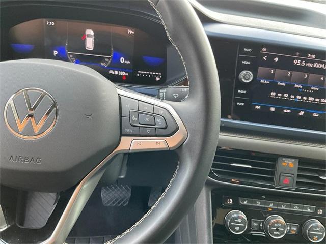 used 2024 Volkswagen Taos car, priced at $23,000
