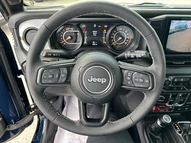 used 2025 Jeep Wrangler car, priced at $49,995