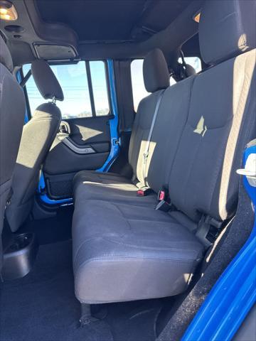 used 2015 Jeep Wrangler Unlimited car, priced at $16,988