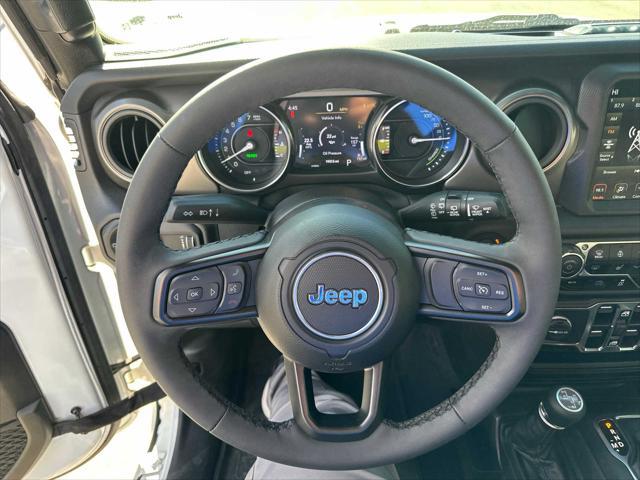 used 2023 Jeep Wrangler 4xe car, priced at $36,988