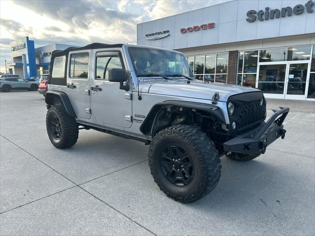 used 2014 Jeep Wrangler Unlimited car, priced at $12,988
