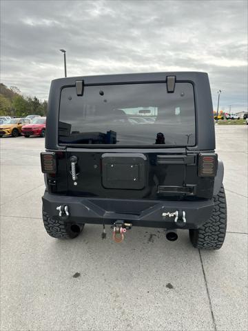 used 2011 Jeep Wrangler Unlimited car, priced at $19,988