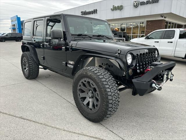 used 2011 Jeep Wrangler Unlimited car, priced at $15,988