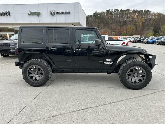 used 2011 Jeep Wrangler Unlimited car, priced at $15,988