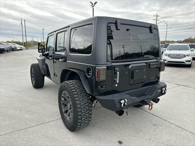 used 2011 Jeep Wrangler Unlimited car, priced at $19,988