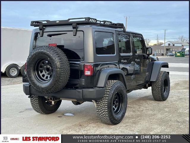 used 2014 Jeep Wrangler Unlimited car, priced at $13,200