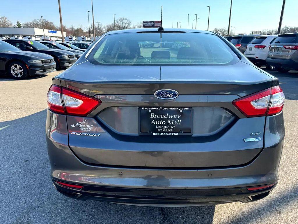 used 2016 Ford Fusion car, priced at $6,980