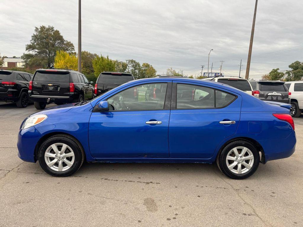 used 2014 Nissan Versa car, priced at $4,980