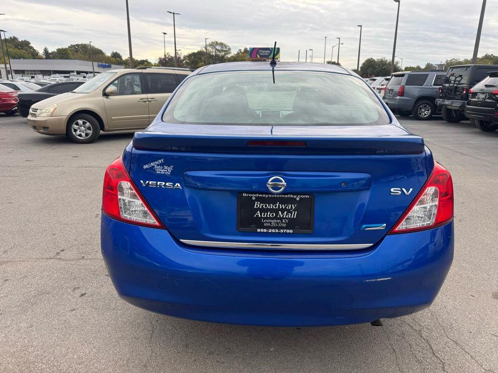 used 2014 Nissan Versa car, priced at $4,980