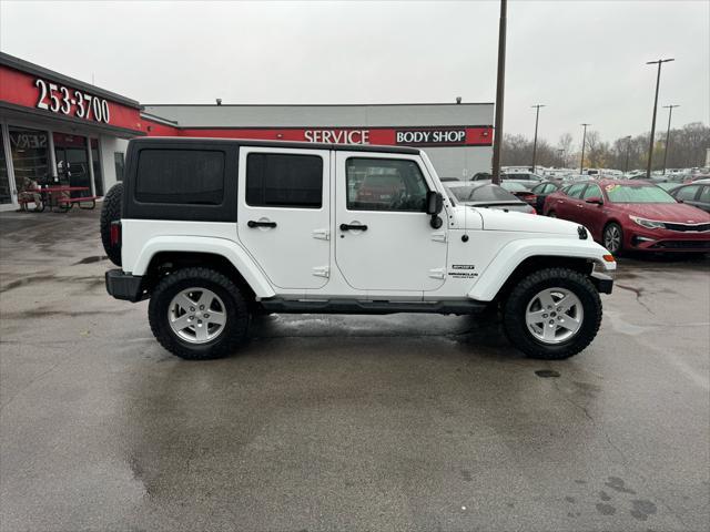 used 2013 Jeep Wrangler Unlimited car, priced at $13,980