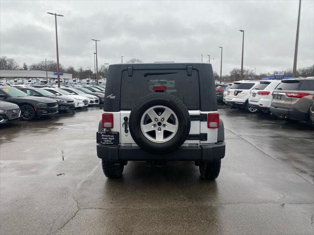 used 2010 Jeep Wrangler Unlimited car, priced at $8,980