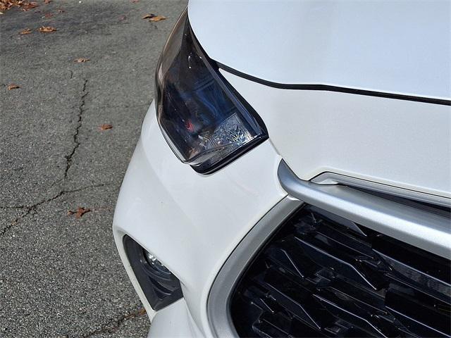 used 2023 Toyota Highlander Hybrid car, priced at $31,899