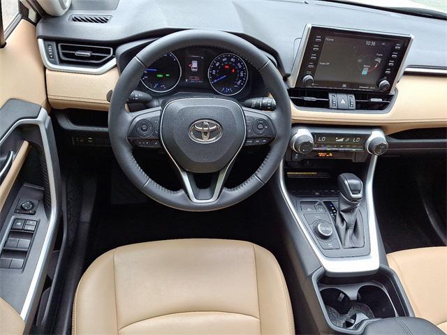 used 2021 Toyota RAV4 Hybrid car, priced at $29,450
