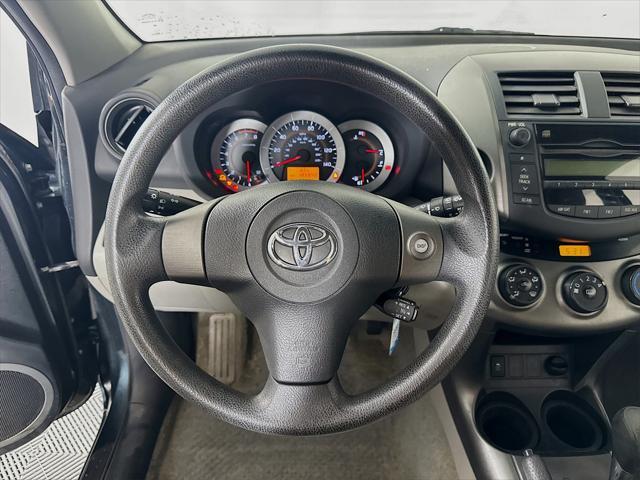 used 2011 Toyota RAV4 car, priced at $9,999