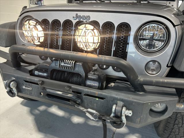 used 2016 Jeep Wrangler Unlimited car, priced at $21,538