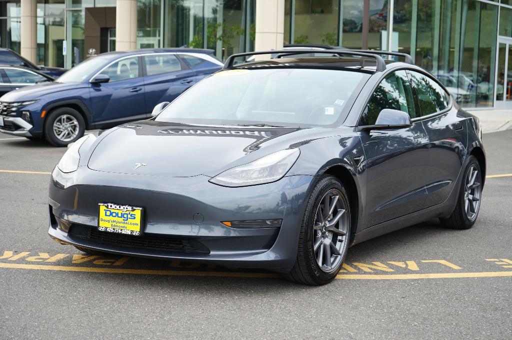 used 2023 Tesla Model 3 car, priced at $27,000