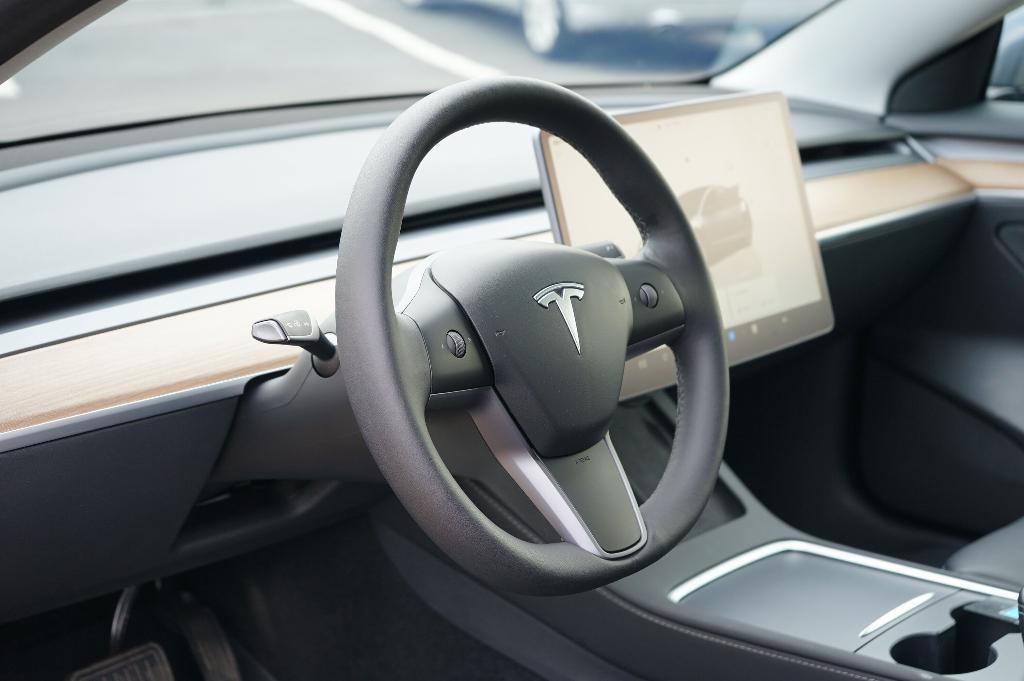 used 2023 Tesla Model 3 car, priced at $27,000