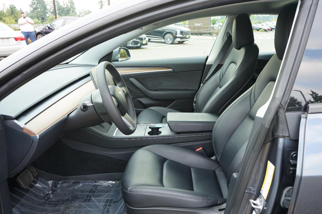 used 2023 Tesla Model 3 car, priced at $27,000