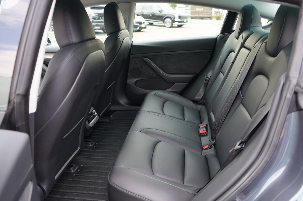 used 2023 Tesla Model 3 car, priced at $27,000
