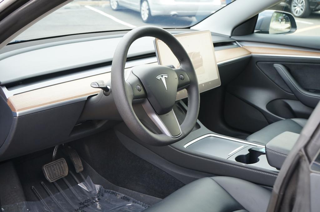 used 2023 Tesla Model 3 car, priced at $27,000