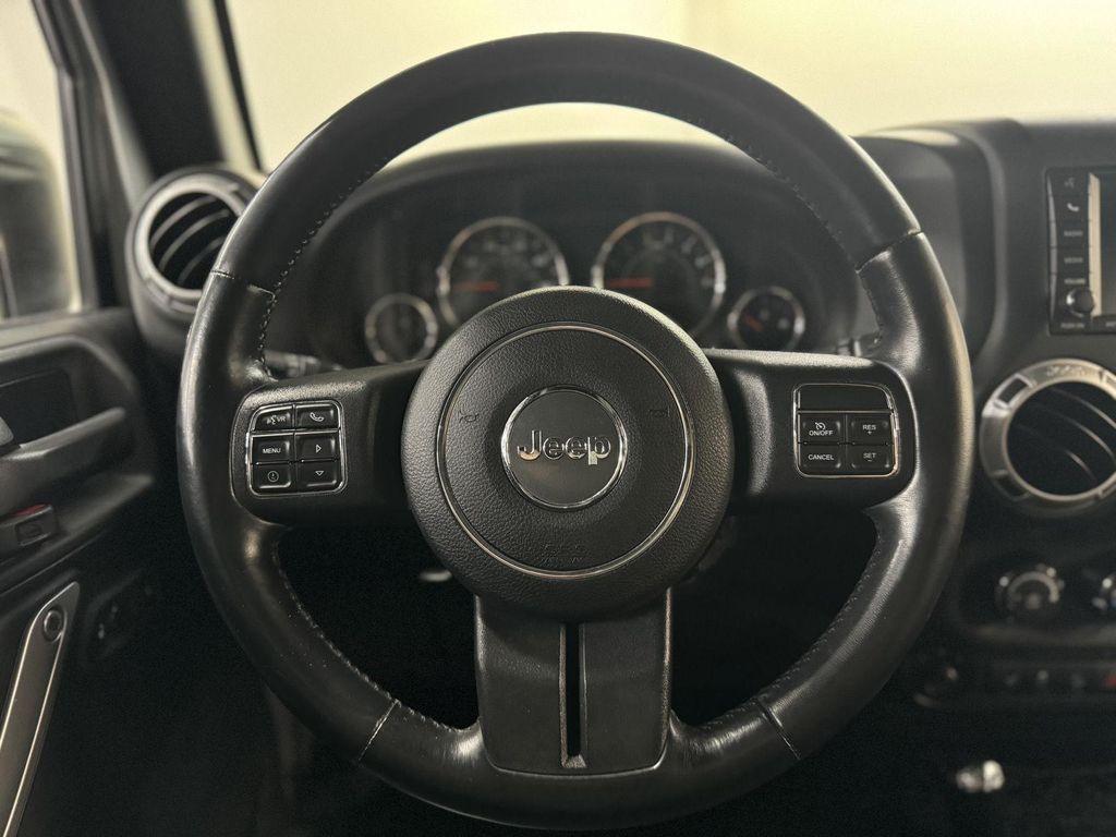 used 2015 Jeep Wrangler Unlimited car, priced at $25,997