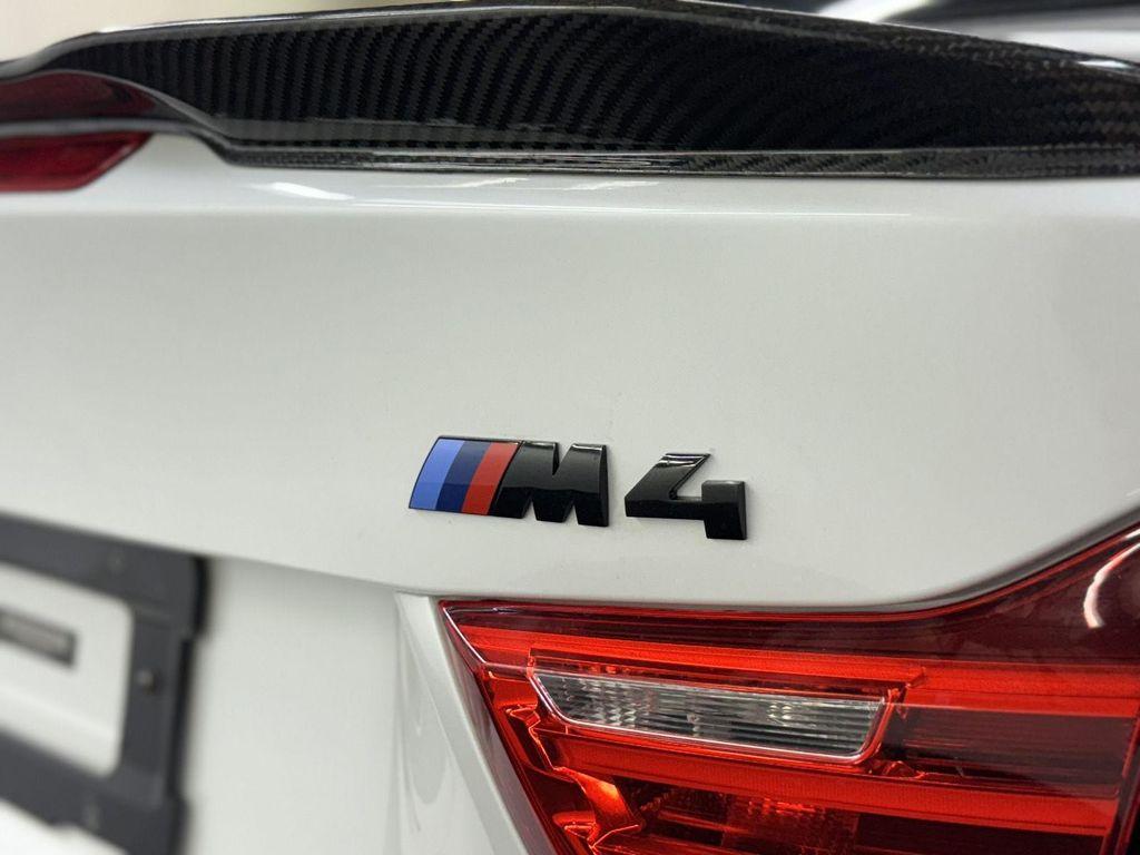 used 2015 BMW M4 car, priced at $41,987