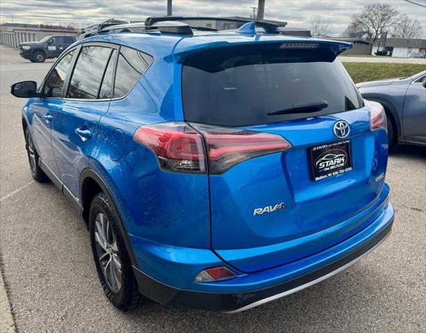 used 2018 Toyota RAV4 Hybrid car, priced at $19,687