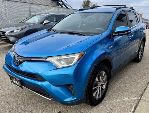 used 2018 Toyota RAV4 Hybrid car, priced at $19,687