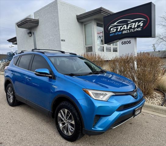 used 2018 Toyota RAV4 Hybrid car, priced at $19,687