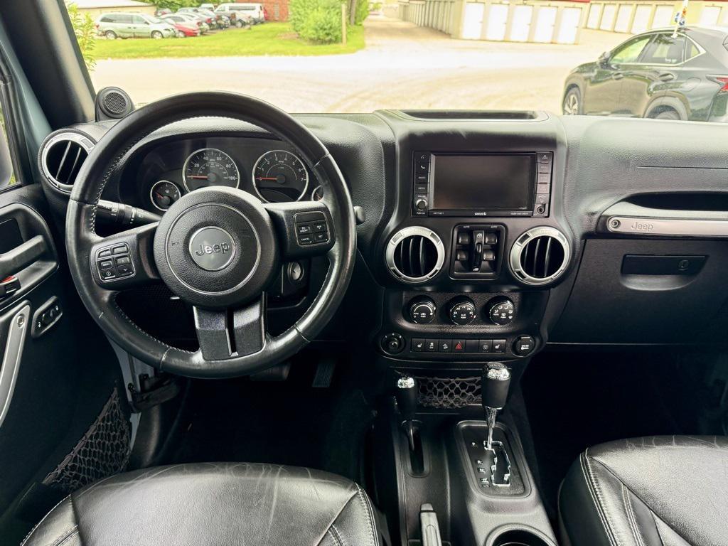 used 2014 Jeep Wrangler Unlimited car, priced at $18,970
