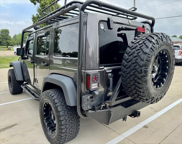 used 2014 Jeep Wrangler Unlimited car, priced at $14,870