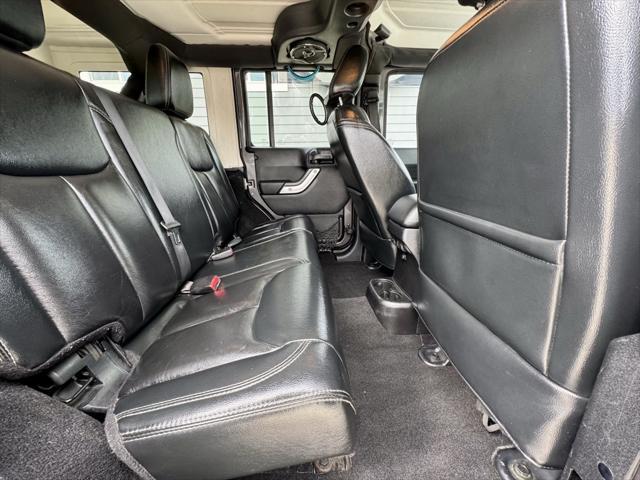 used 2014 Jeep Wrangler Unlimited car, priced at $14,870