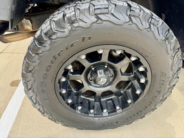 used 2014 Jeep Wrangler Unlimited car, priced at $14,870