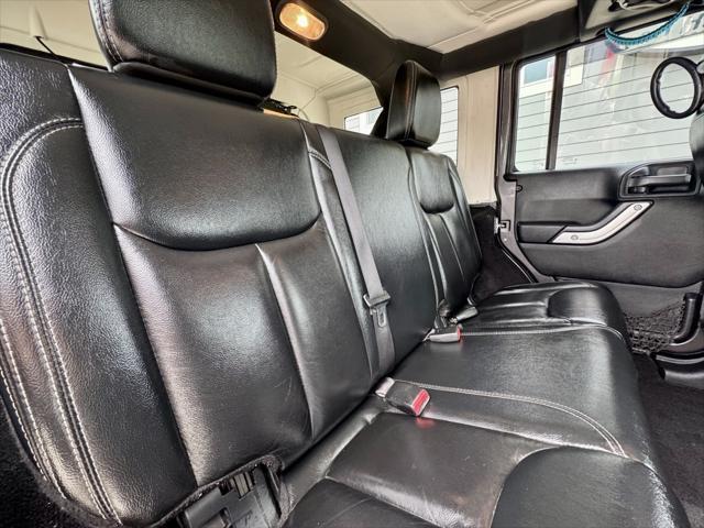 used 2014 Jeep Wrangler Unlimited car, priced at $14,870