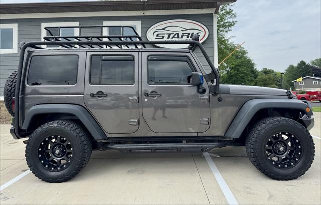 used 2014 Jeep Wrangler Unlimited car, priced at $14,870