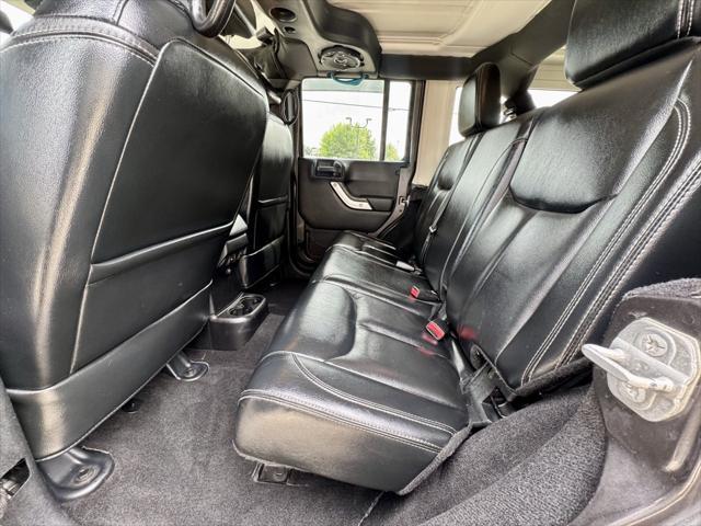 used 2014 Jeep Wrangler Unlimited car, priced at $14,870