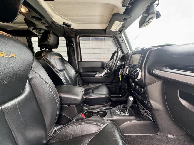 used 2014 Jeep Wrangler Unlimited car, priced at $14,870