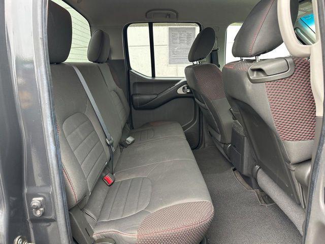 used 2010 Nissan Frontier car, priced at $12,000