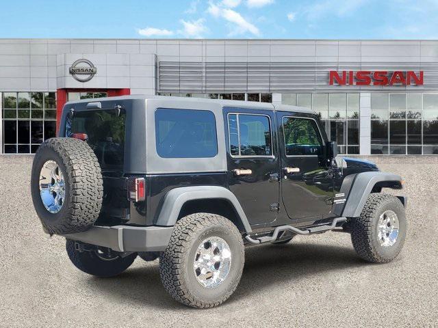 used 2015 Jeep Wrangler Unlimited car, priced at $15,999
