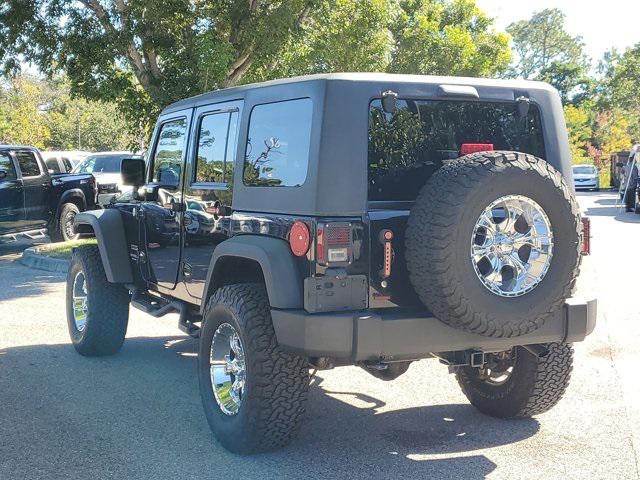 used 2015 Jeep Wrangler Unlimited car, priced at $15,999