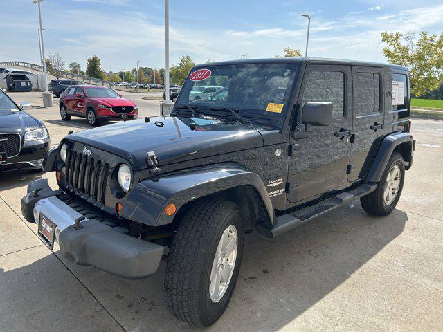used 2011 Jeep Wrangler Unlimited car, priced at $11,492