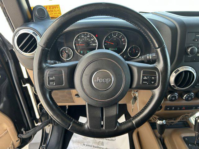 used 2011 Jeep Wrangler Unlimited car, priced at $11,492