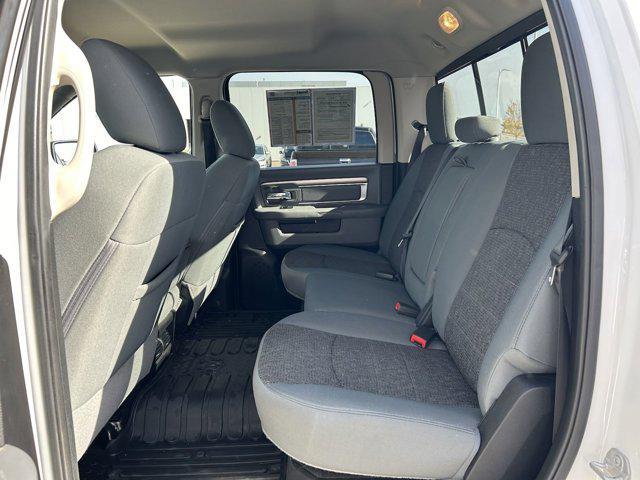 used 2018 Ram 1500 car, priced at $24,303